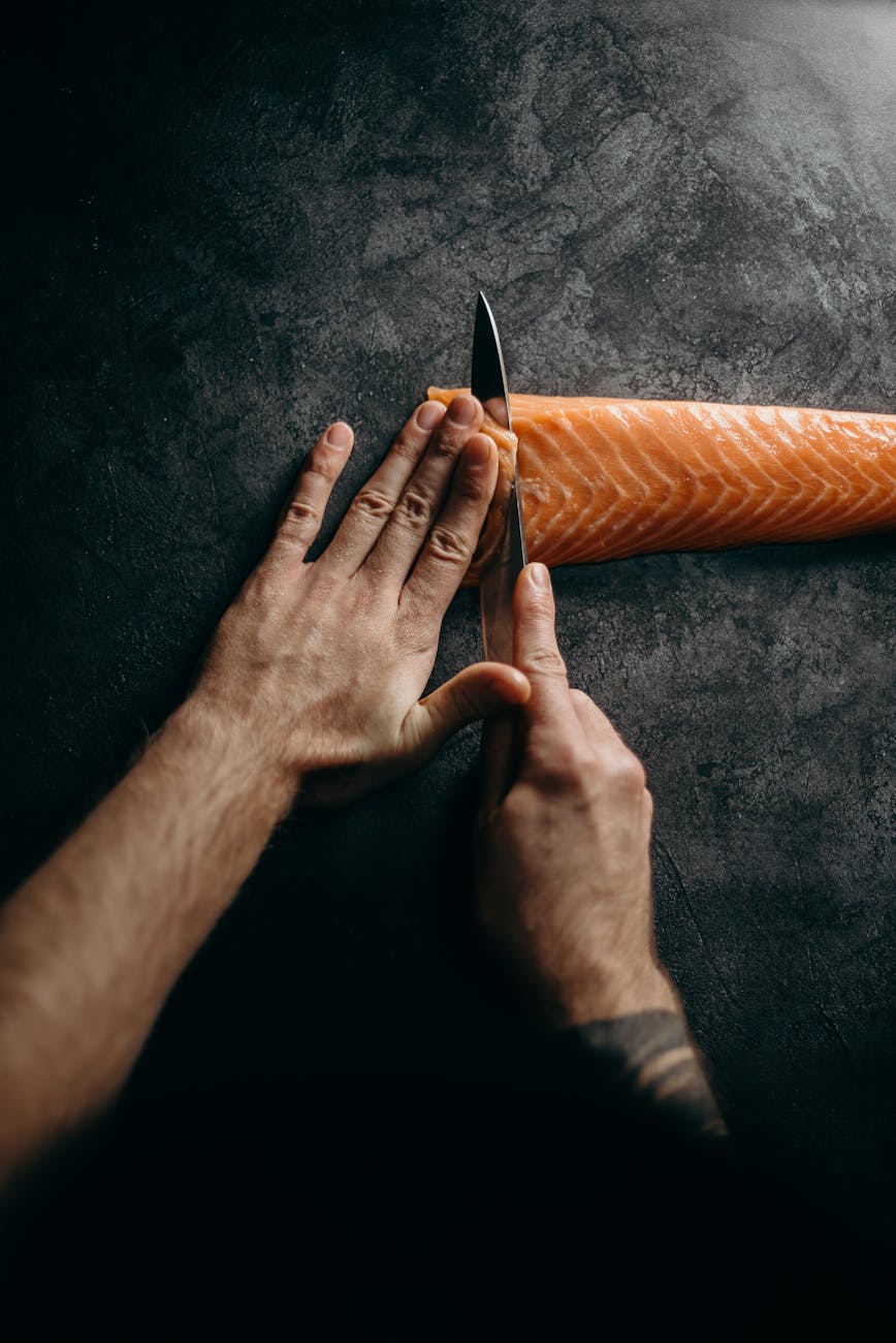 photo of person holding knife