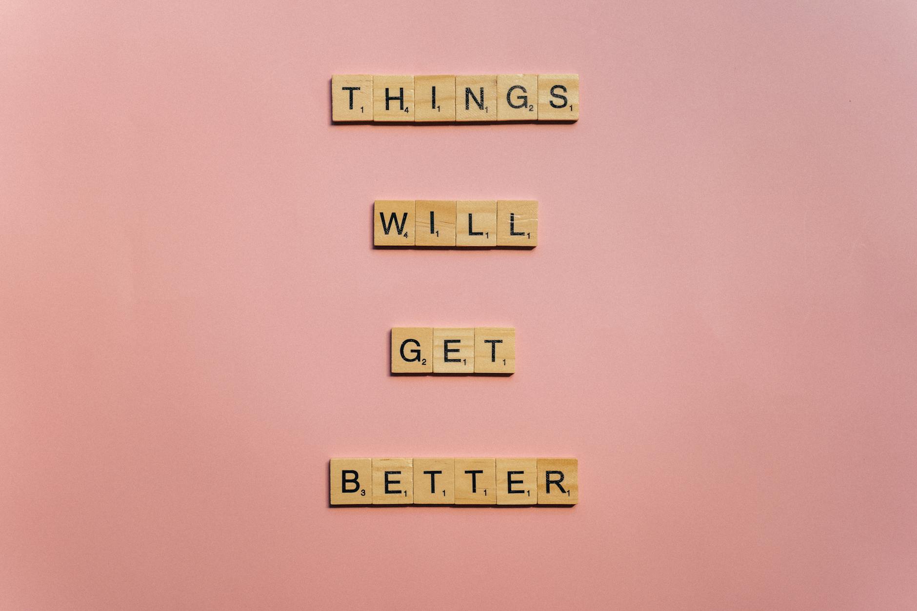wooden letter tiles on a flat surface