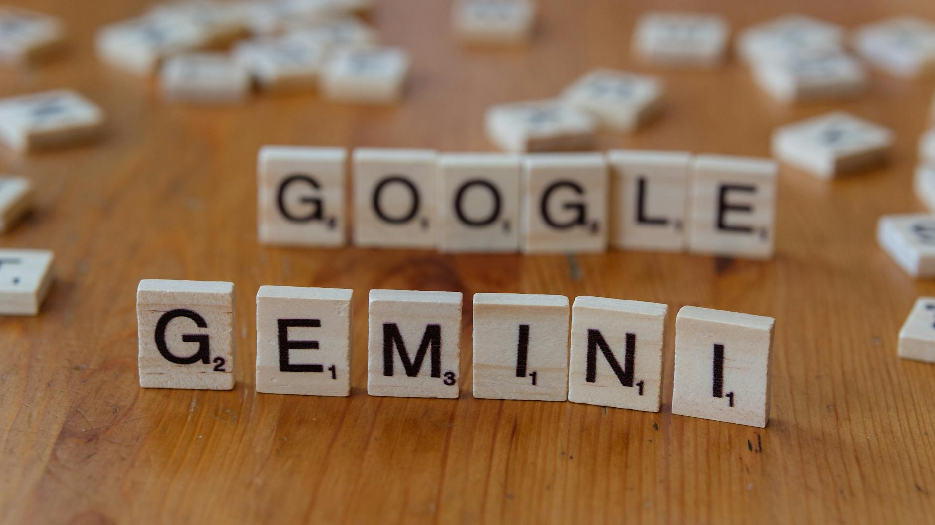scrabble tiles form words google and gemini